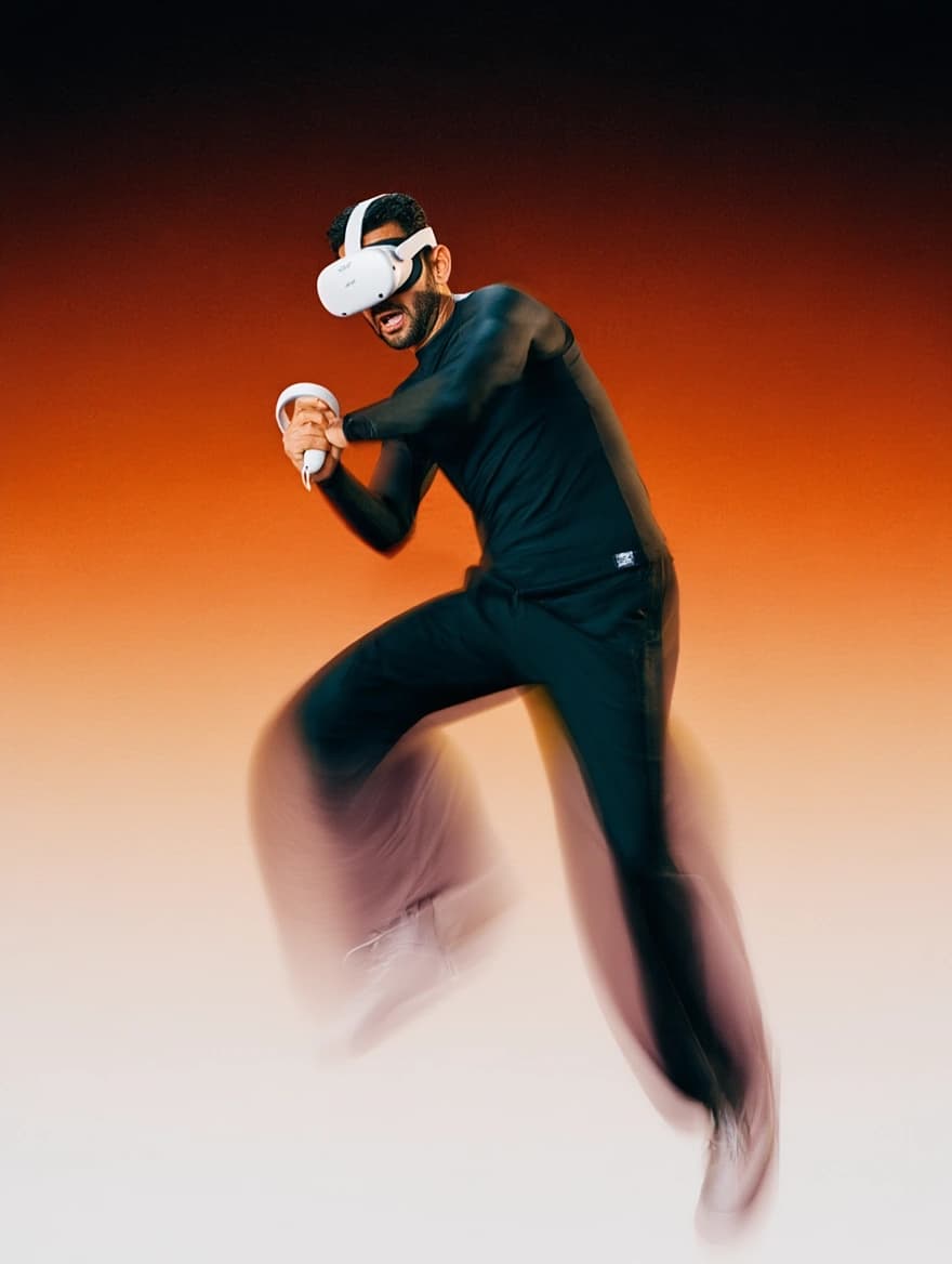 A VSBasket player in VR gear jumping mid-motion with a controller, blurred with spin